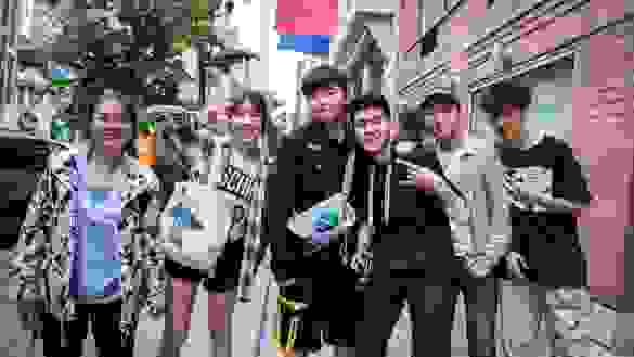 Group of students posing in front of the SVA main building.
