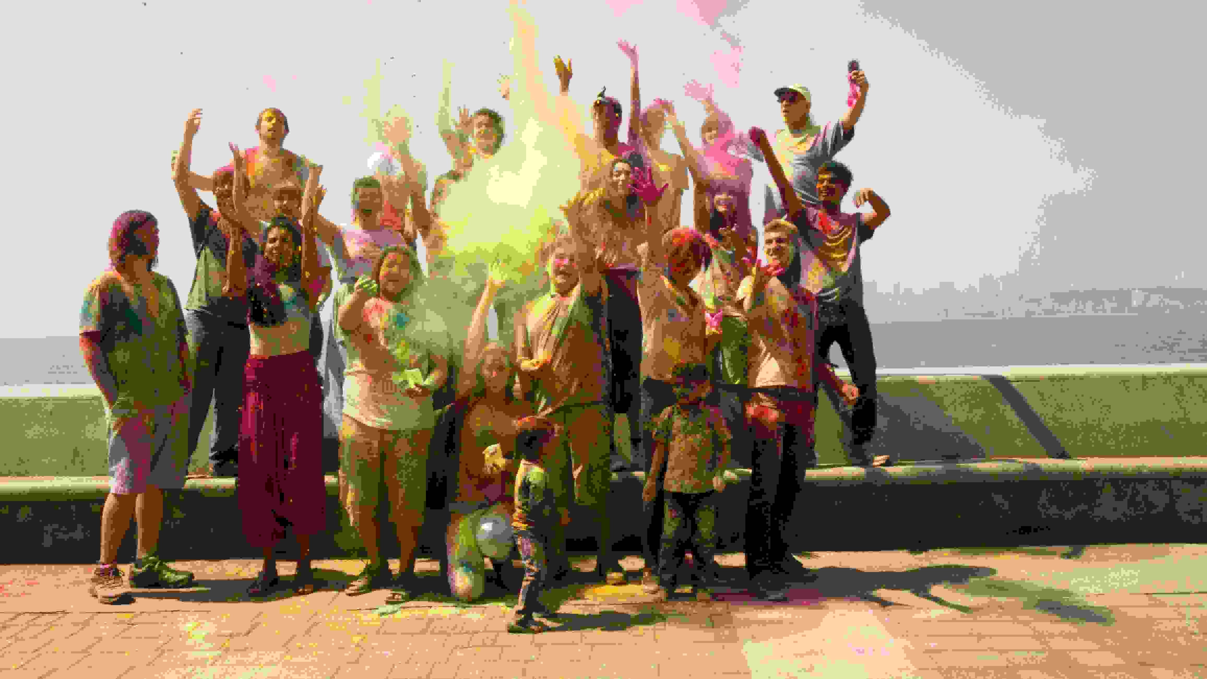 Students celebrating Holi, the festival of colors in Mumbai, India.