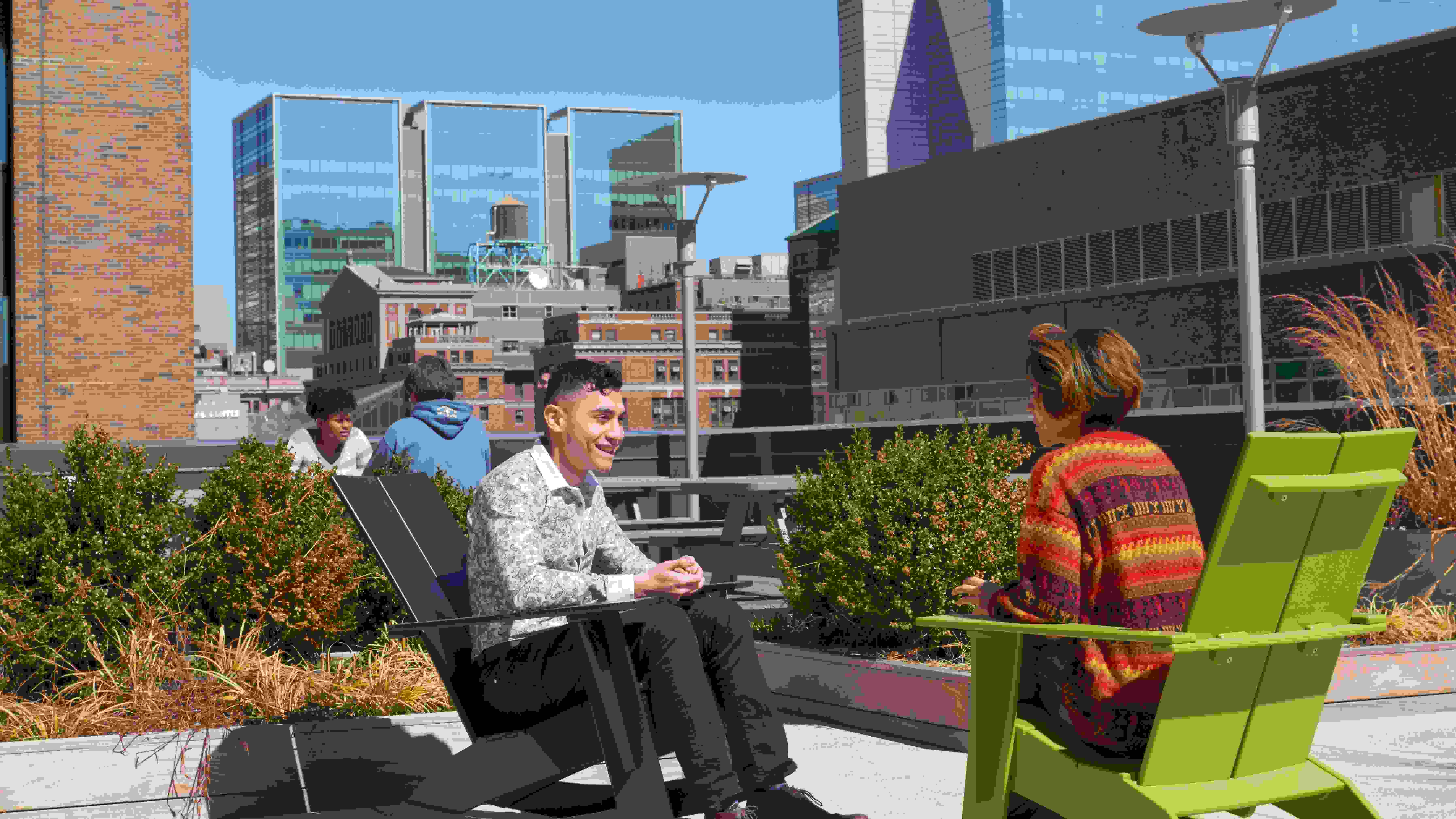 Students enjoying the terrace at the 24th Street Residence