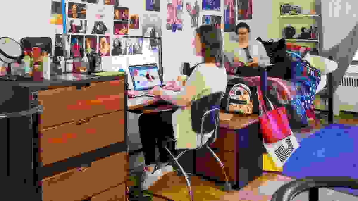 Two students in a dorm.
