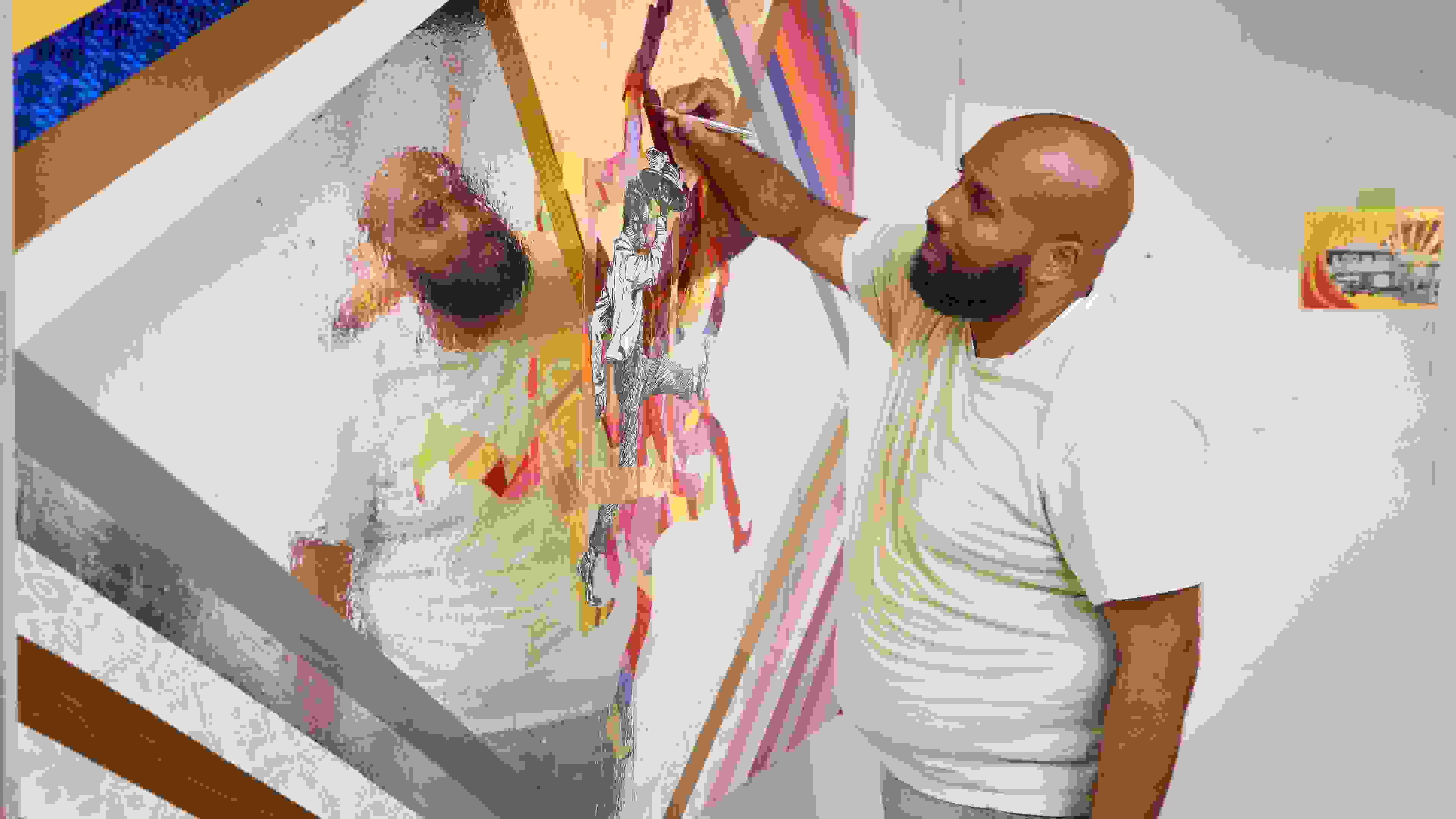 Student painting large mixed-media piece