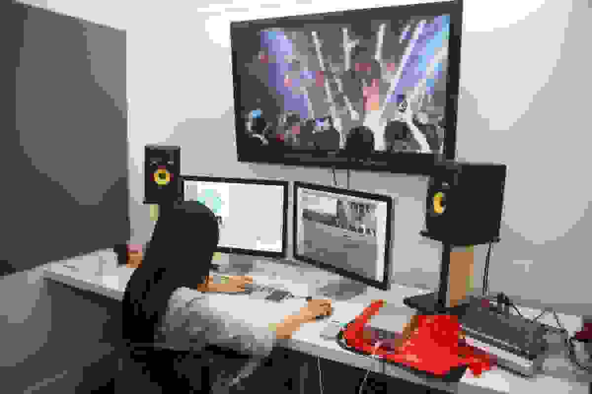 Student working in video production suite.