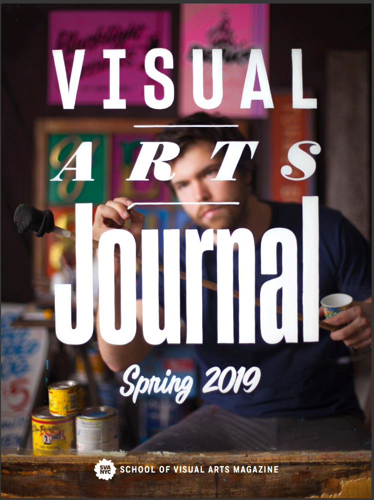 A magazine cover featuring a photograph of a sign painter at work. He is painting the magazine's title on a pane of glass between himself and the camera.