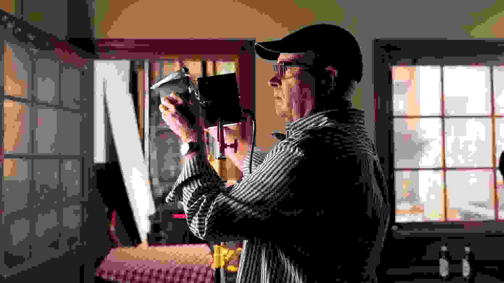 Student adjusting light