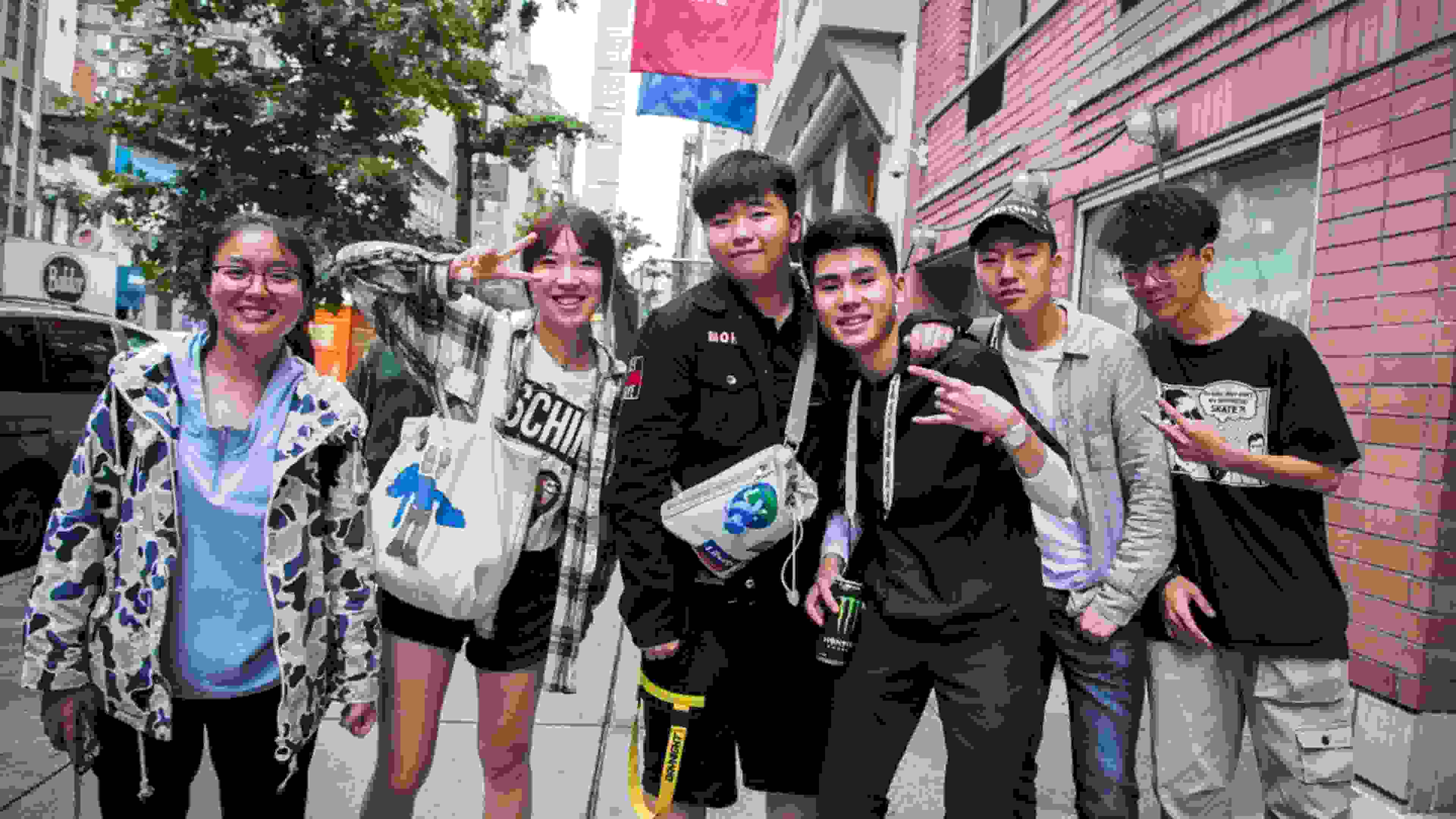 Group of students posing in front of the SVA main building.