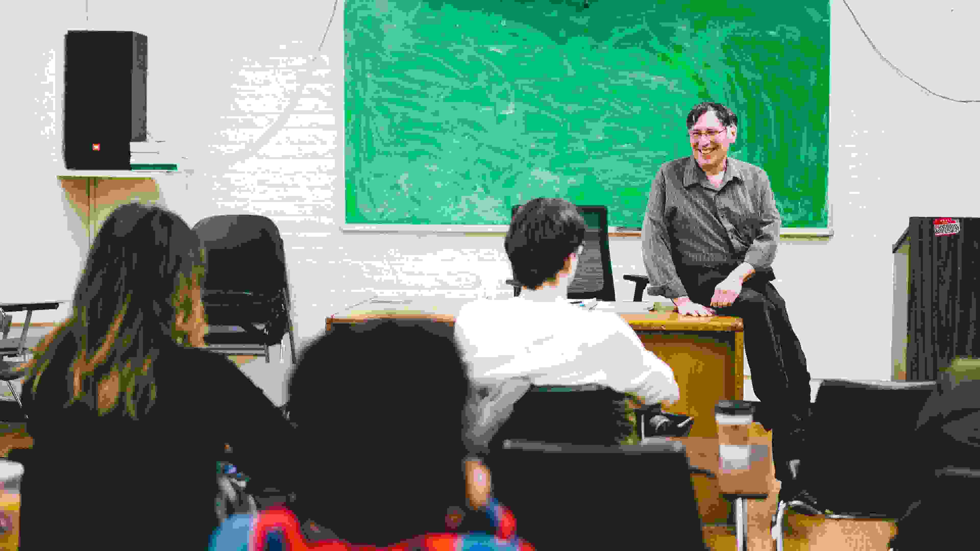 Teacher and Students in a classroom.