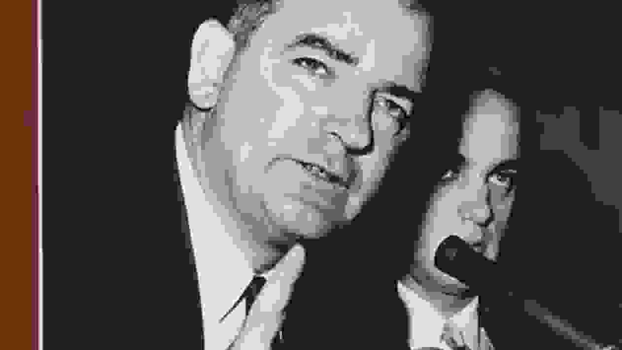 Photograph of McCarthy at a trial.