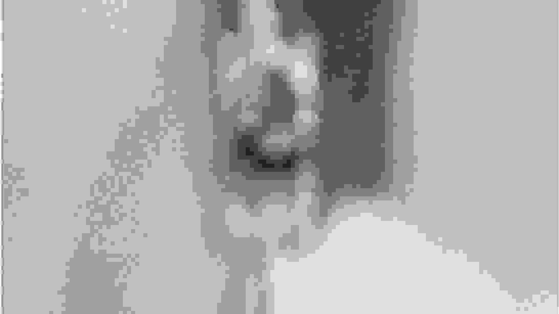 Photograph of a blurry earring.