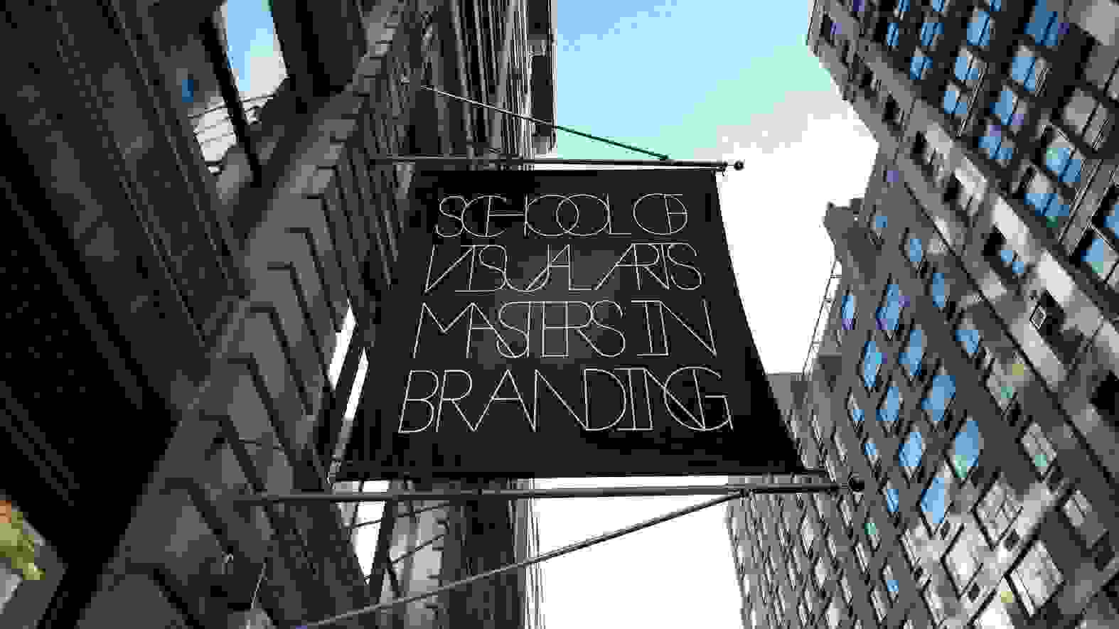 Photograph of a banner outside a Manhattan building that says "School of Visual Arts Masters In Branding"