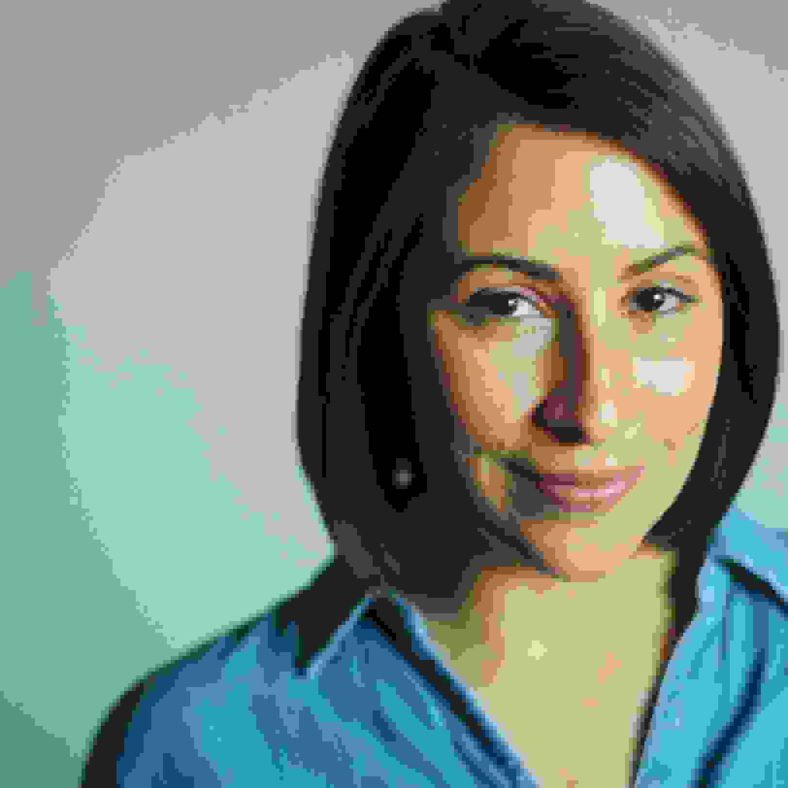 headshot of woman in blue shirt