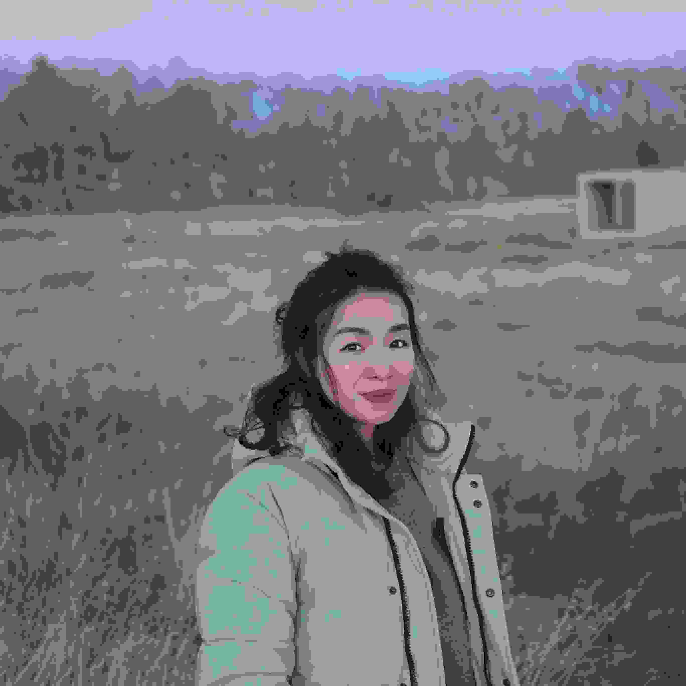 woman in green jacket