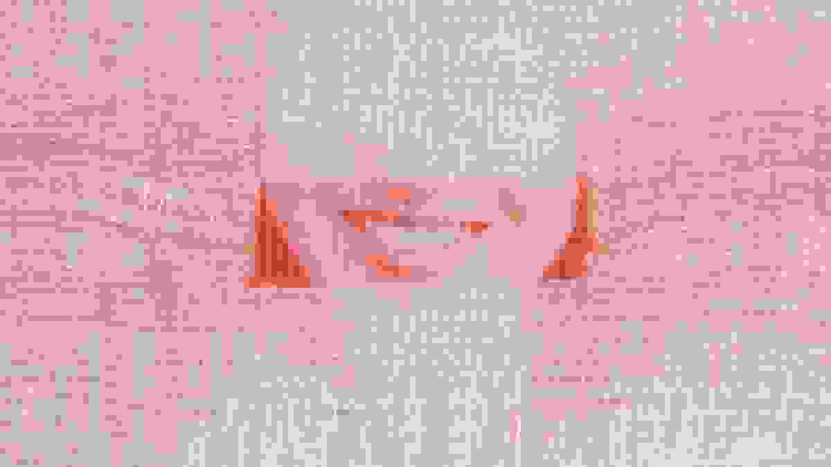 A woven photograph of a closely cropped woman's smile, made of red and white thread.