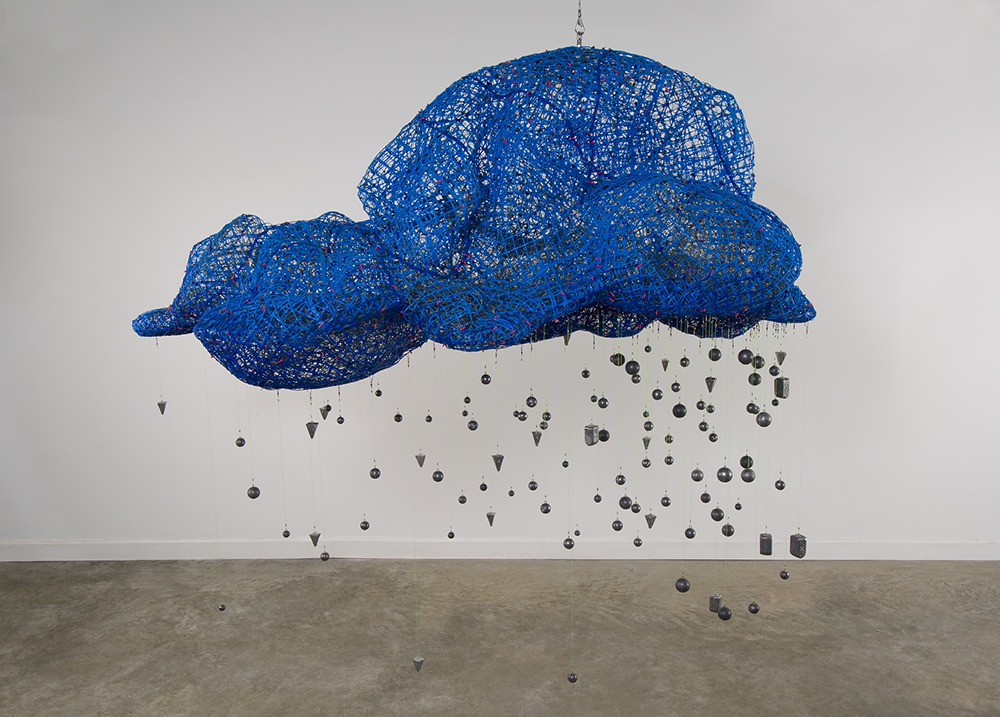 <p "="">A hanging sculpture made of bunched fencing and resembling a cloud, with fishing weights standing in for raindrops.