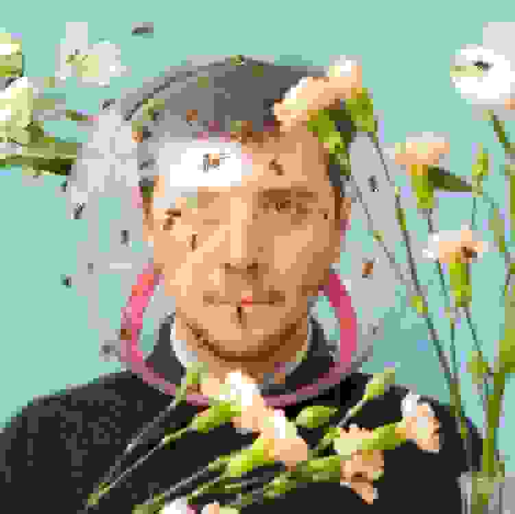 <p "="">A man surrounded by bees and flowers wears a protective glass helmet.
