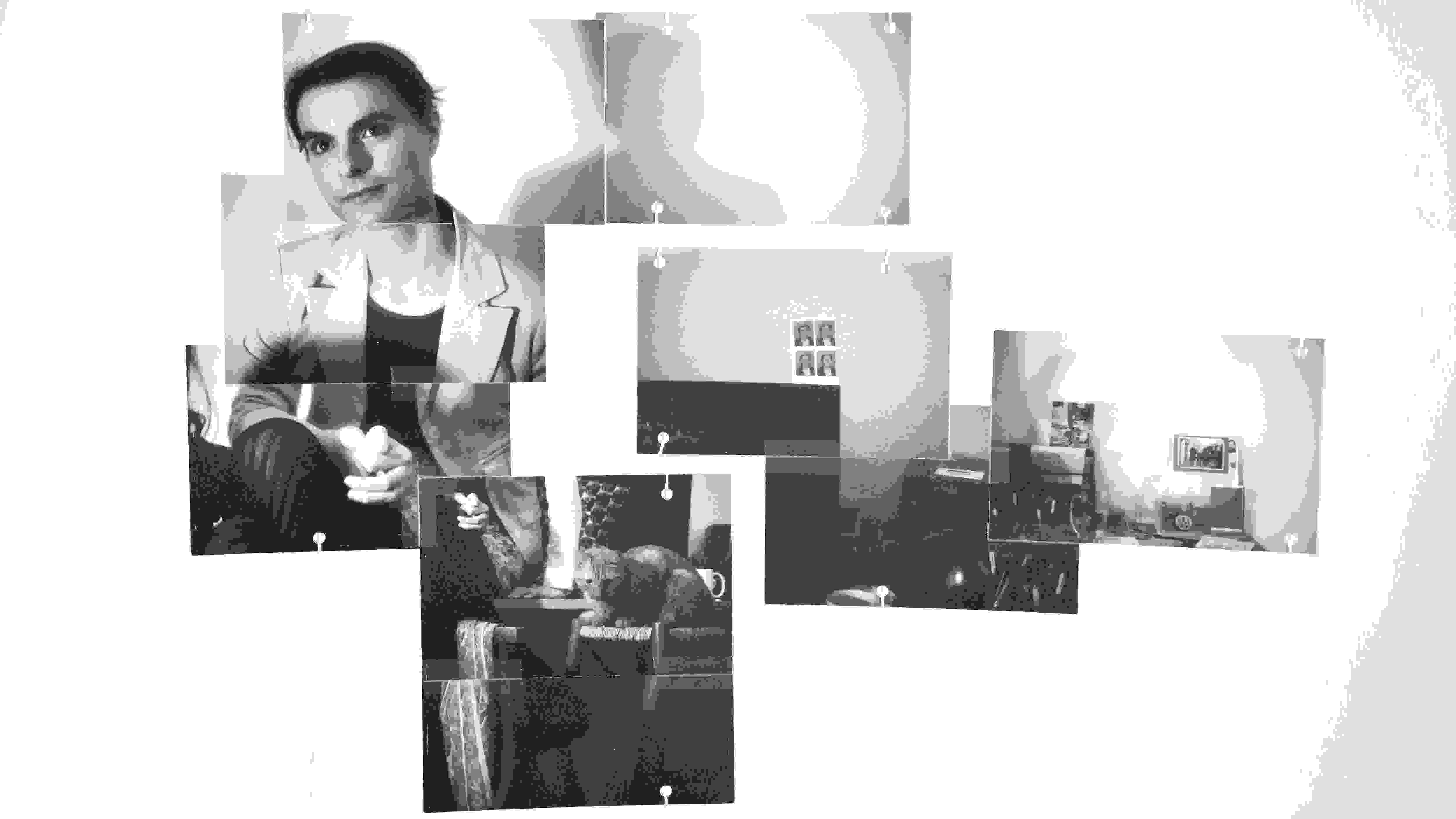 black and white photos hanging from wire
