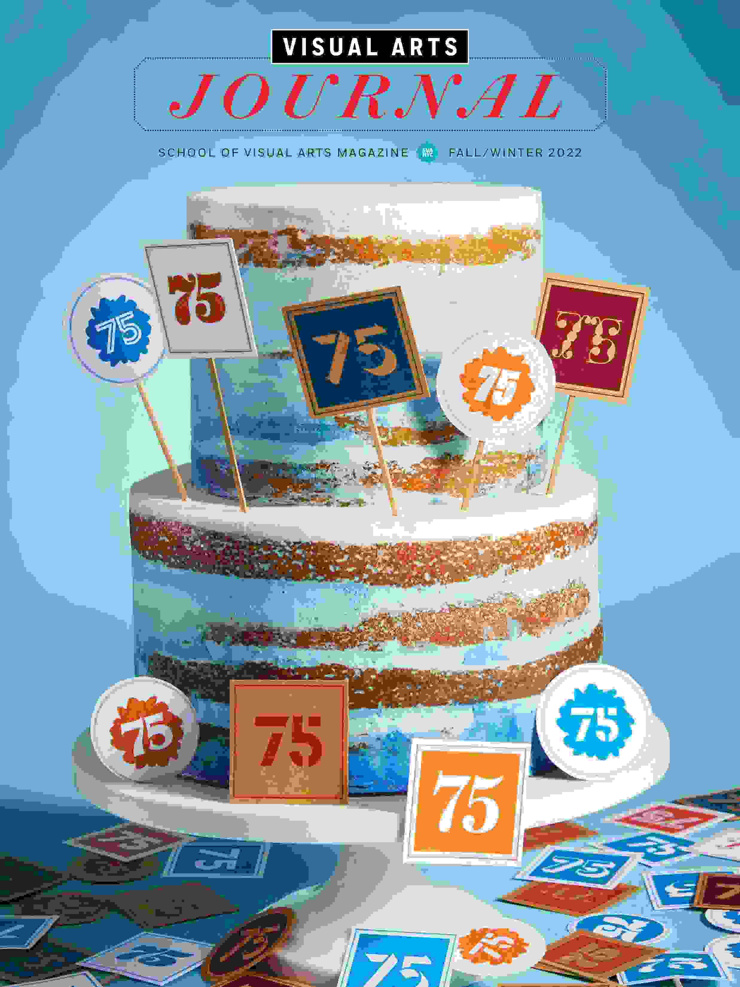 A magazine cover featuring a photograph of a two-tiered cake that has been decorated with a number of small signs bearing the number 75.
