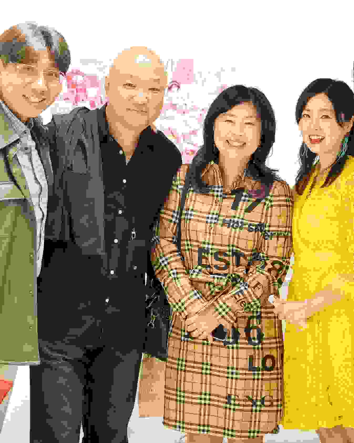 A group of people pose for a photo in SVA's Andrew Chang Gallery in Seoul.