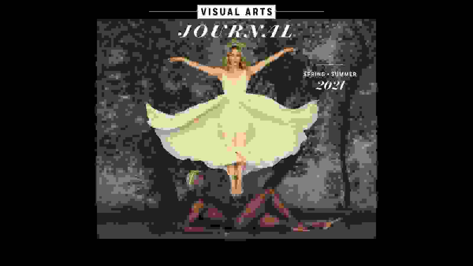 A photograph of two dancers—one lying on the ground and the other midair with arms outstretched.