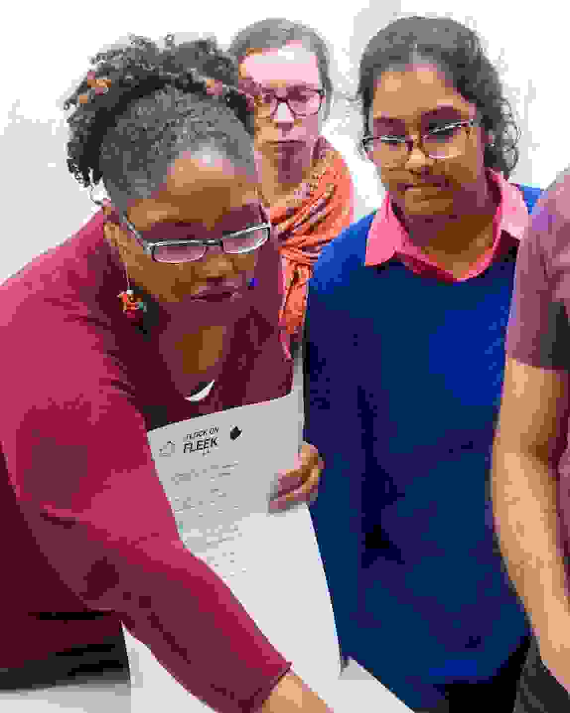 Students gathered around table.