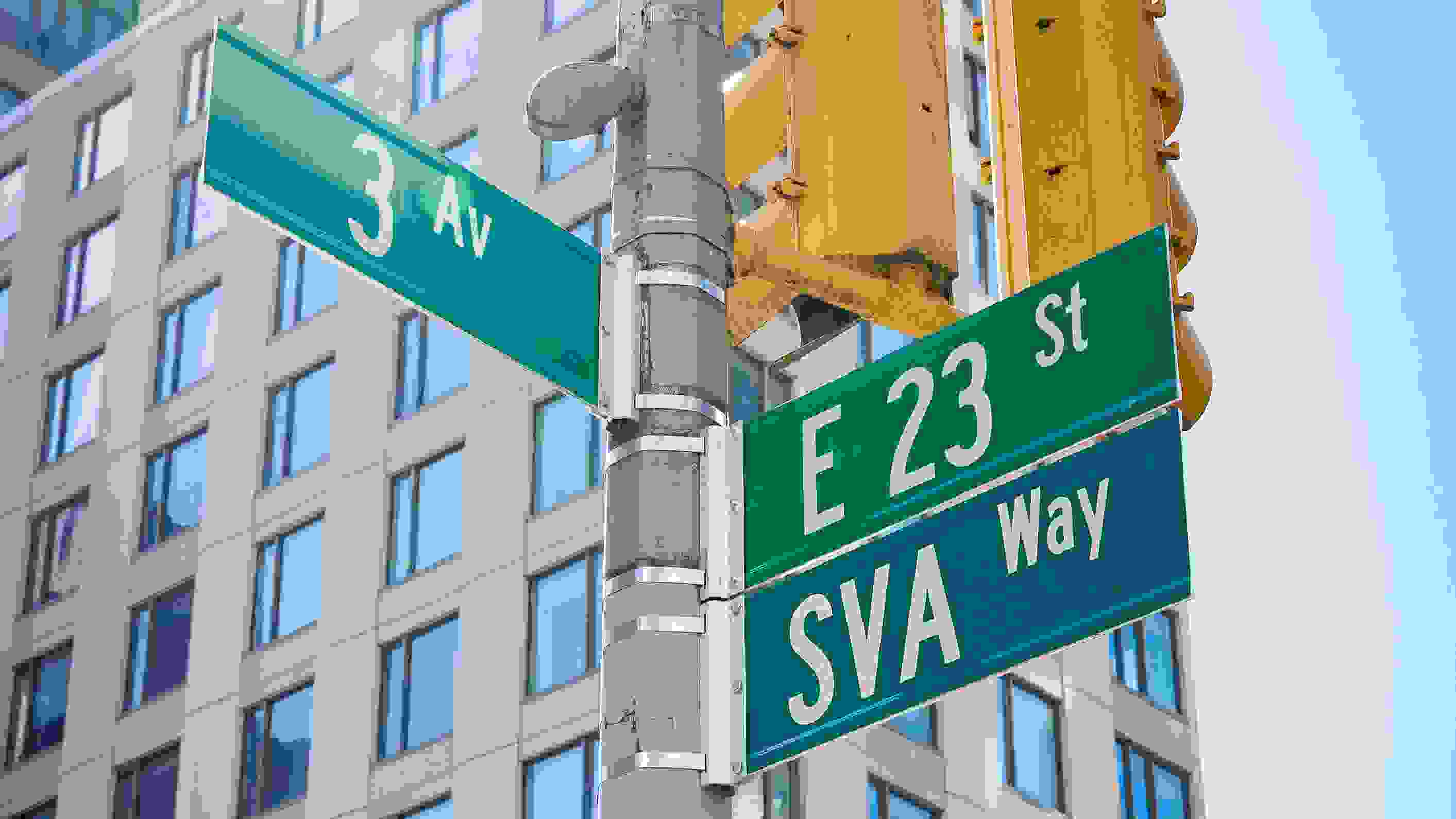 NYC cross street on the corner of 23rd St. and 3rd Ave., with newly installed “SVA Way” co-naming street sign by DOT