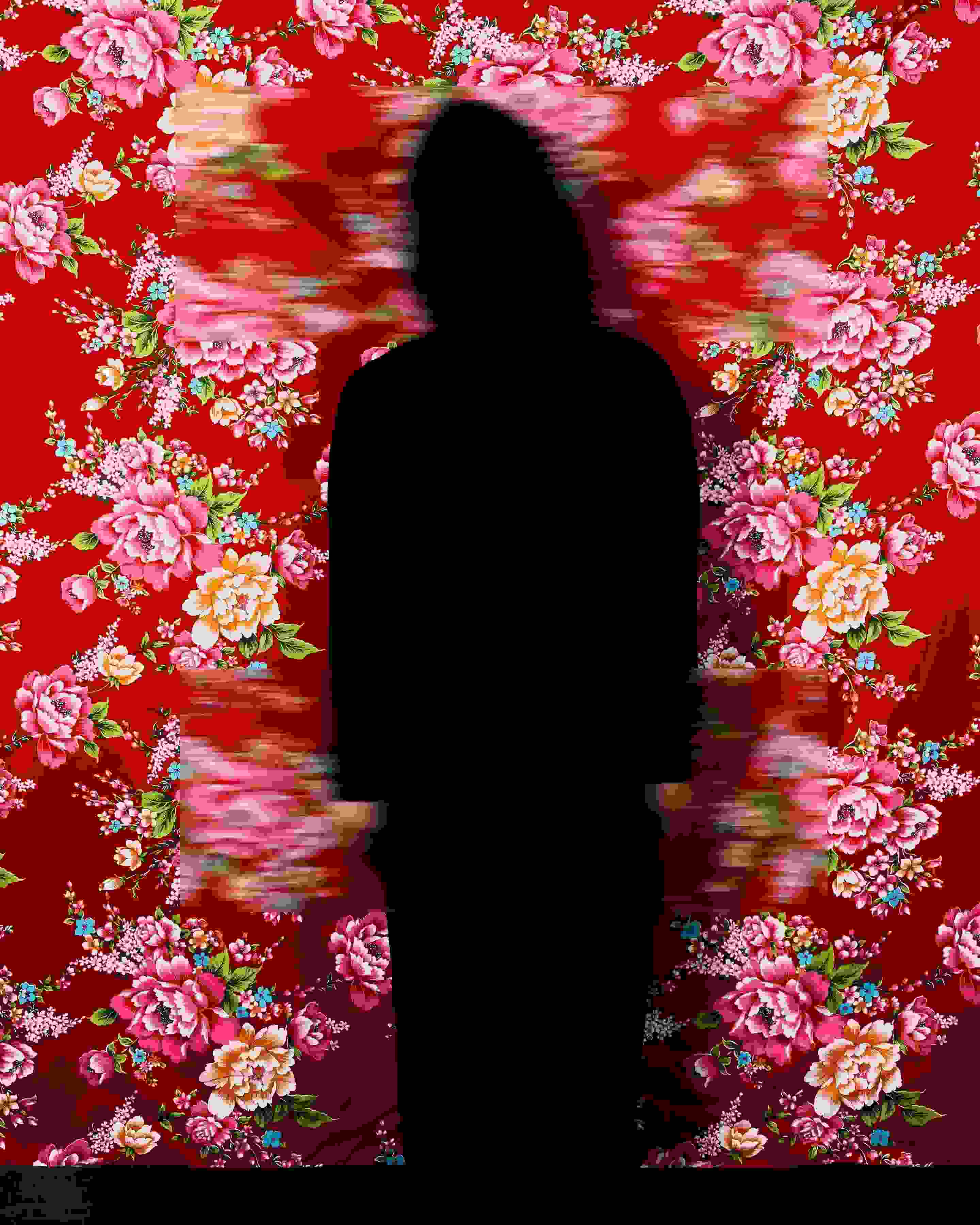A black silhouette stands in front of a bright red floral wallpaper with two rectangular patches blurred.