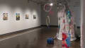 The second gallery with paintings on the left wall and soft-sculptural pieces on the right.