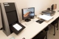 A work station with a monitor and scanner