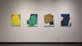 Another set of collages use large geometric shapes of multiple colors to form abstract compositions.