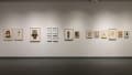A view of the back gallery shows one wall full of collages.