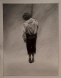 A man is hanging from a noose.
