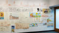 Wall covered in preparatory artist sketches.