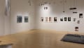 Multiple views of SVA Flatiron Gallery and Windows with installation, photographs, and textile throughout the gallery. 
