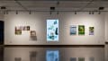 Multiple views of SVA Chelsea Gallery. There are photographs hung on the wall, installations and projections throughout the gallery. 
