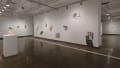 Multiple views of SVA Chelsea Gallery with framed and unframed photographs, video, and installation with projectors. 
