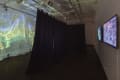 Multiple views of SVA Chelsea Gallery with framed and unframed photographs, video, and installation with projectors. 
