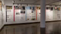 Multiple views of SVA Chelsea Gallery. Posters are hung on the walls. The second gallery has two projections on opposite walls with chairs in the center. 