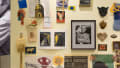 Ephemera wall from Milton Glaser's studio including various prints, photographs, and small sculptures.
