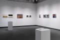 An Installation photograph of the gallery showing framed prints