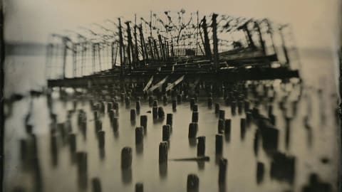 An 8x10 tintype of a burned out pier on the West Side Highway