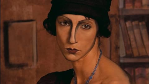 A color photo of a woman that looks somewhat like a Modigliani painting taken for a book called, After Images, about photographic interpretations of modernist photographs