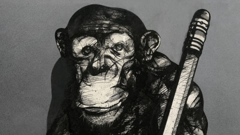 Black and white poster with a chimpanzee holding a large pencil while standing on a sheet of paper.
