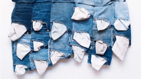 Denim jeans in a collage with the pockets sticking out. 
