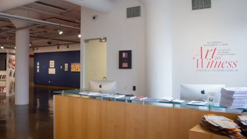 Photograph from main entry of SVA Chelsea Gallery with wall text stating the title of the exhibition.