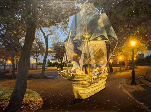 Oil painting of a ghostly ship in a modern-day park in early Autumn. The ship is a light yellow/white with large translucent sails.