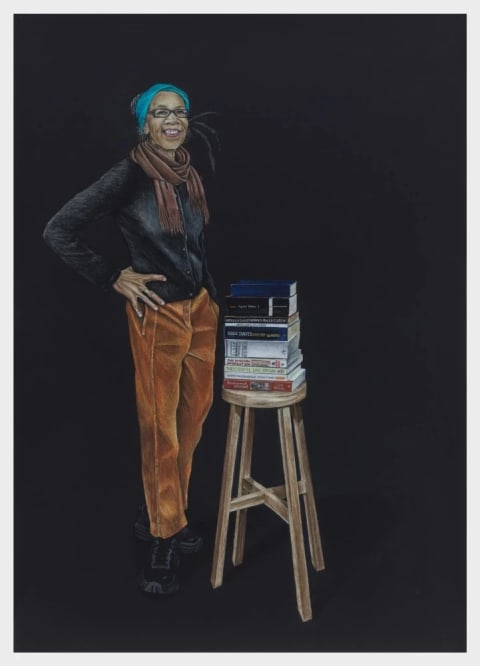 colored-pencil drawing of a black woman with glasses standing next to a stack of books on a wooden stool. The background is completely black.