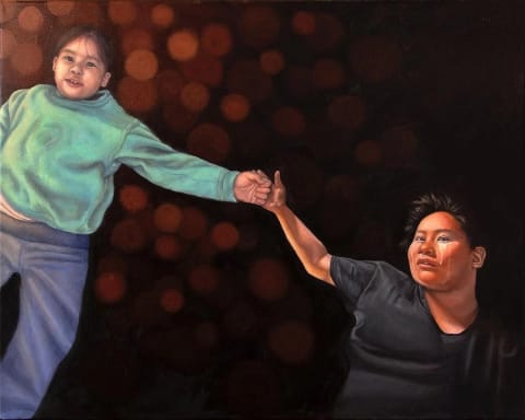 An oil painting of two figures, one a young child and another a young woman. They're holding hands, laying down on a dark black and read floor.