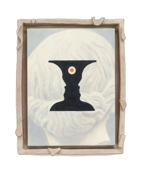 A light painting of the back of a statue's head featuring a bun with a painting of a black shape overtop. The frame is made out of a pinkish ceramic. 