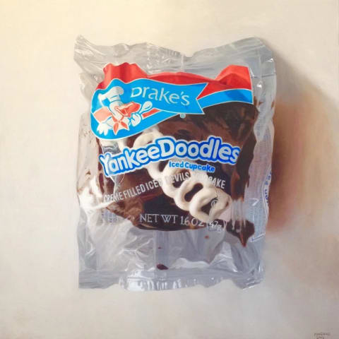 A hyperrealistic oil painting of a yankee doodle sweet in a clear wrapper. The sweet is a chocolate cupcake with a squiggle of white icing across it