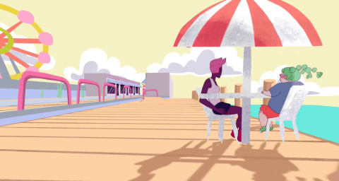 A still featuring two people sitting at a white table on a boardwalk. The sky is clear and yellow and there is a ferris wheel in the background.