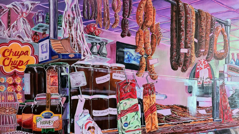 Painting showing a deli counter crowded with canned goods and products, with sausage hanging from the ceiling.